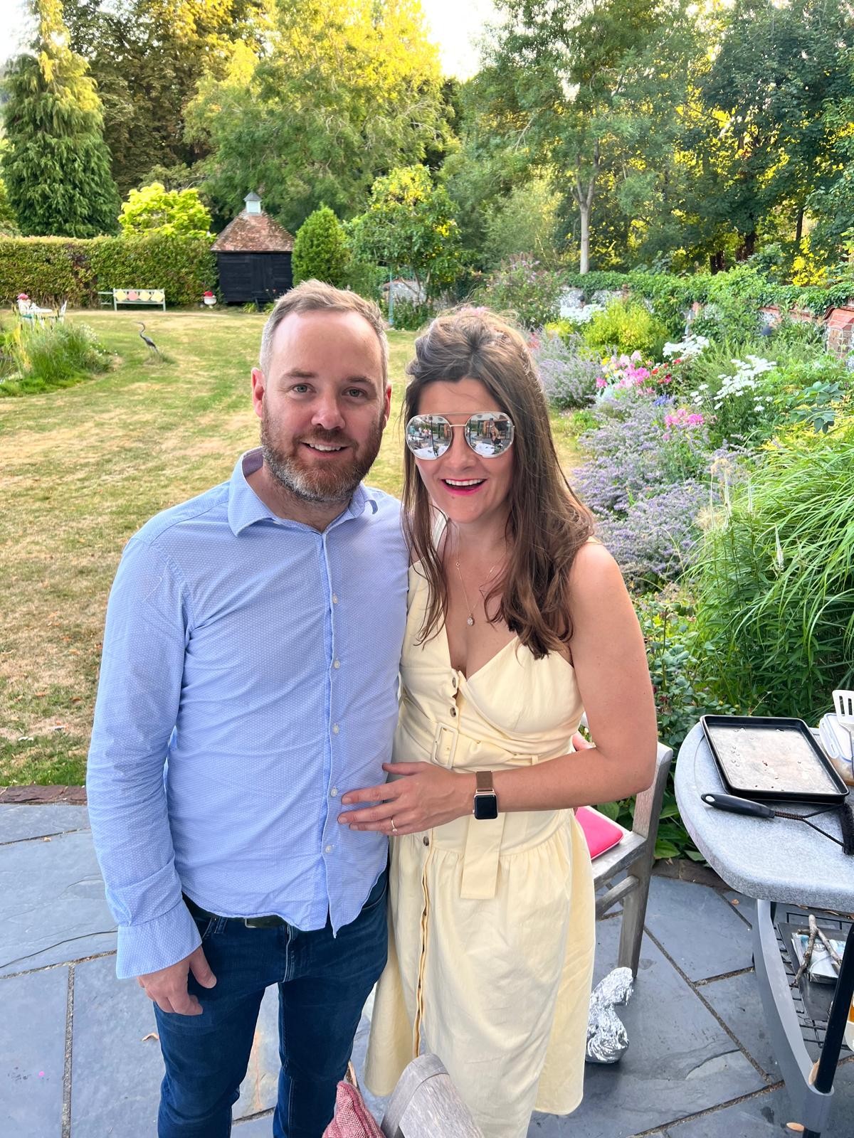 Darren and Lucie in a summer garden